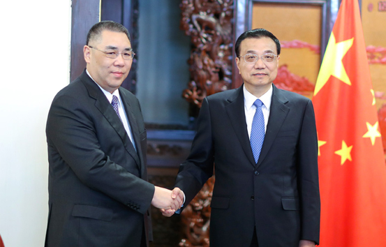 李克强会见来京述职的崔世安